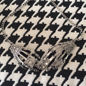 Skeleton hand necklace